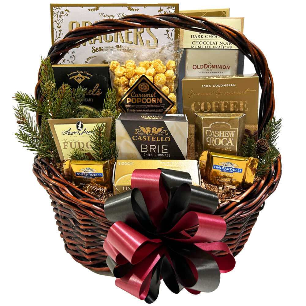 Christmas Express Gift Basket with gourmet chocolates, Brie cheese, caramel popcorn, coffee, sugar cookies, and assorted treats in a wicker basket with decorative bow
