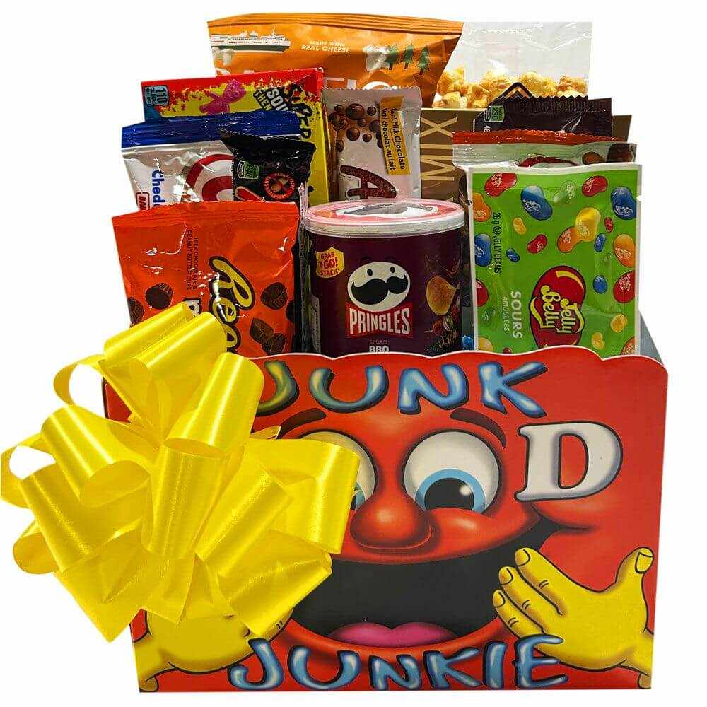 Junk Food Junkie Gift Basket with assorted snacks including Pringles, Jelly Belly, Reese’s, and popcorn in colorful box with yellow bow