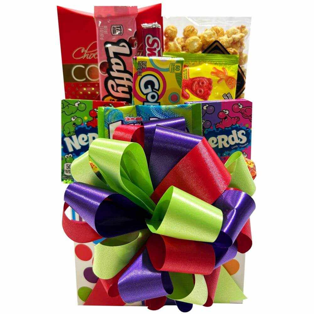 Smiles and Giggles candy gift bouquet with lollipops, Nerds, Sour Patch Kids, chocolate chip cookies, and colorful bow in polka dot box