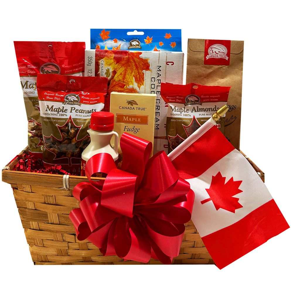 Canada Gift Basket with maple treats, fudge, popcorn, syrup, and Canadian flag in wicker container