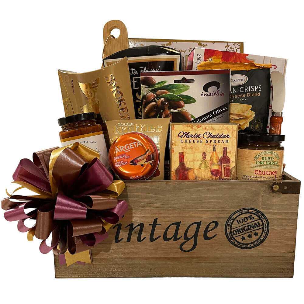 Bon Appetit Gift Basket with smoked salmon, cheese spread, crackers, chutney, and gourmet snacks in a wooden box with bow
