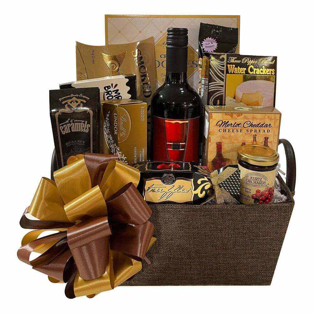 The Aristocrat Gift Basket with Merlot wine, smoked salmon, cheeses, chocolates, crackers, and assorted gourmet treats in a decorative basket with gold and brown bow
