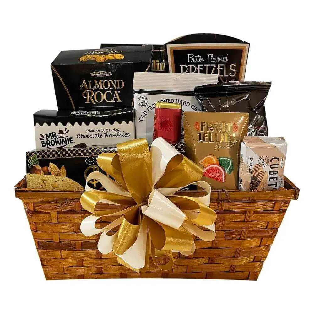 Thinking Of You Gift Basket with assorted snacks and treats in a natural wicker basket with decorative bow