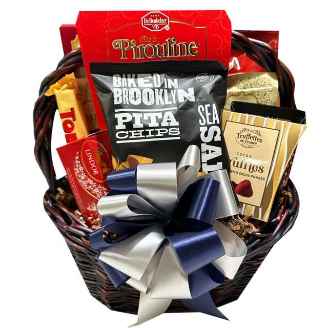 Kosher gourmet gift basket with chocolates, treats, and hot chocolate in dark willow basket
